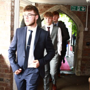 boys walking into their prom
