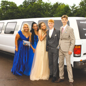 students by a limo